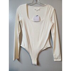 NWT Wild Skye Woman's Body Suit Size Medium  Cream Button Closure
